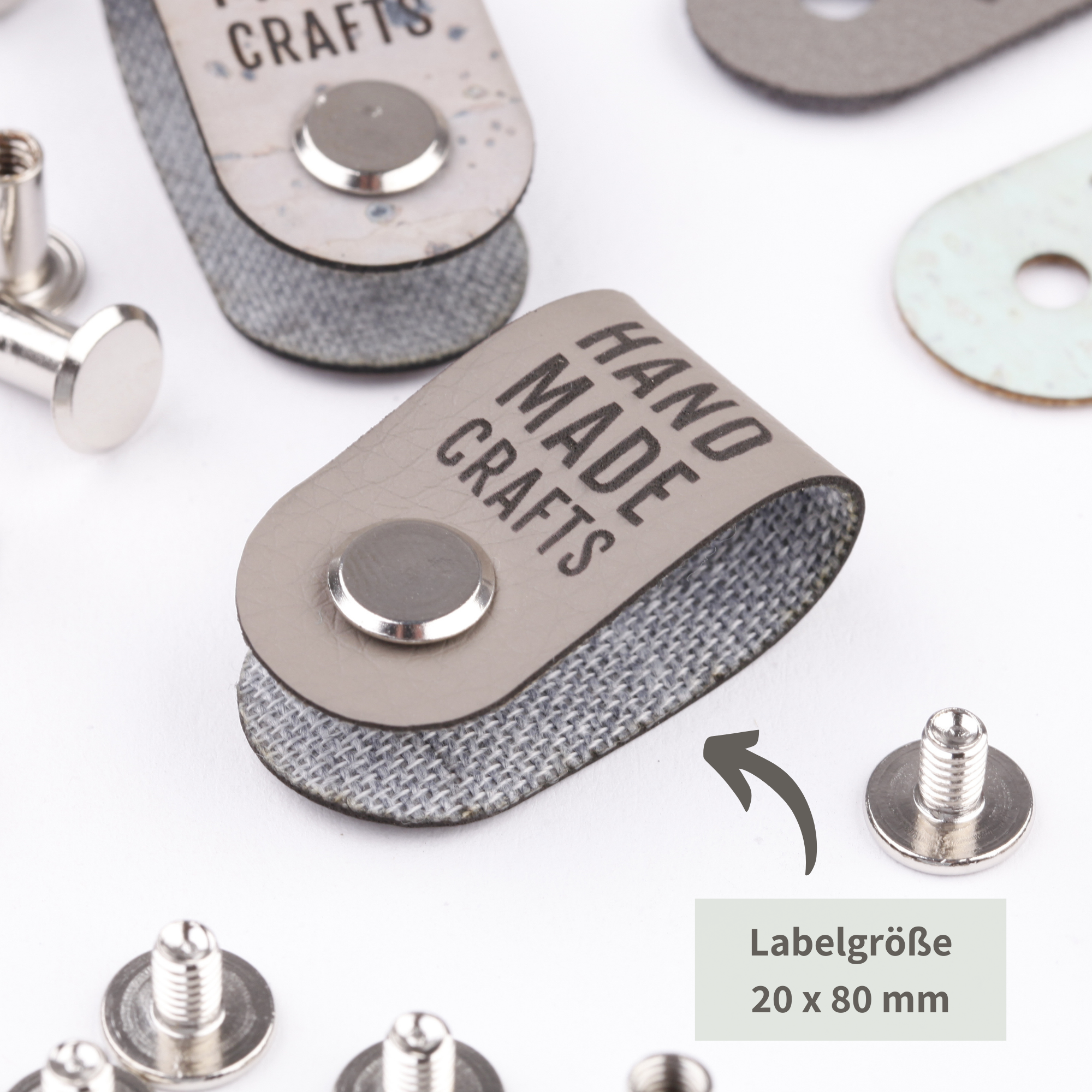 Kunstlederlabel mit Schraube "handmade crafts"