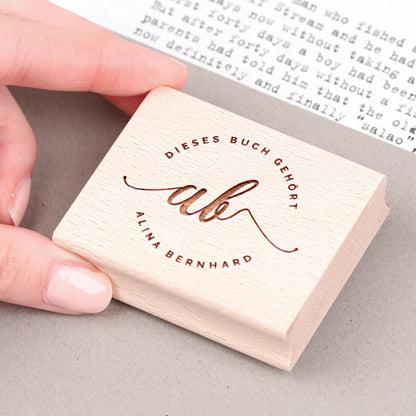 Runder Exlibris-Stempel mit Initialen