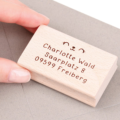 Stempel mit Adresse und Augen